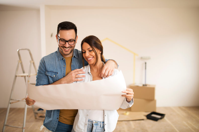 Young couple renovating their home